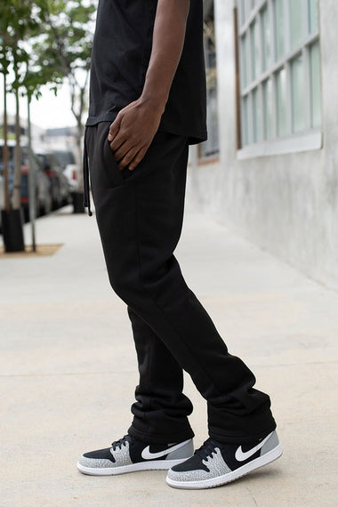 FLARED STACKED FLEECE PANTS